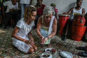 The Santeria religion is hundreds of years old -- a mix of beliefs brought to Cuba by Yoruba slaves from West Africa, and Catholicism.  By ADALBERTO ROQUE (AFP)