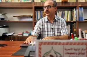 The seminary has a large collection of old Islamic manuscripts that historian Fathi al-Zirkhani is eager to preserve for posterity.  By Mahmud TURKIA (AFP)