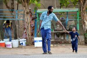 The truce has allowed some to venture out, including this man and boy in Omdurman.  By - (AFP)