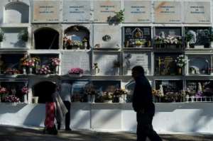 There are rows of tombstones in Tarifa where unnamed migrants are buried.  By JORGE GUERRERO (AFP)