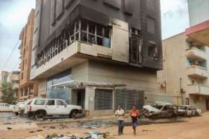 There has been widespread looting and arson in the Sudanese capital Khartoum.  By - AFP