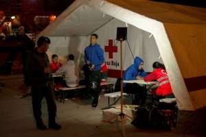 Thirty-four migrants rescued recently from an inflatable boat were taken to Algeciras to be attended to by the Red Cross, before being handed to police.  By JORGE GUERRERO (AFP)