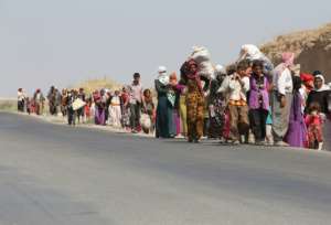 Thousands of Iraqis from the Yazidi community were forced to flee in 2014 when the Islamic State group stormed across swathes of Iraq and Syria.  By AHMAD AL-RUBAYE (AFP/File)