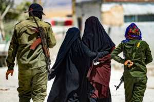 Thousands of people believed to be relatives of IS fighters are held at the Al-Hol camp in Syria.  By DELIL SOULEIMAN (AFP/File)