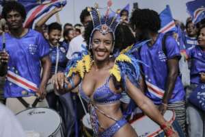 Throngs of supporters played music and cheered as Cape Verdes Blue Sharks made their way through Praia.  By Jose Correia (AFP)