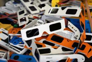 To see a solar eclipse, wear specifically designed glasses that meet the standard ISO 12312-2:2015.  By Jaime REINA (AFP/File)