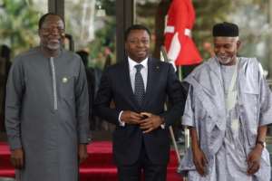 Togo President Faure Gnassingbe (M) has more recently sought to position himself as a regional mediator.  By Kola Sulaimon (AFP)