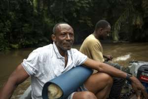 Tommy Garnett founded the Environmental Foundation for Africa whose work played a key role in Tiwai island becoming a UNESCO Heritage Site.  By Saidu BAH (AFP)