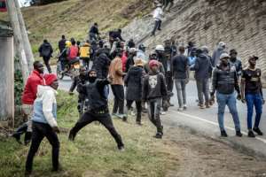 Top politicians routinely hire gangs of thugs to protect them and fight opposing gangs.  By Luis TATO (AFP)