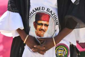 T-shirt support: Mohamed Bazoum, the candidate for the Nigerien Party for Democracy and Socialism, is the frontrunner in Sundays vote.  By Issouf SANOGO (AFP)