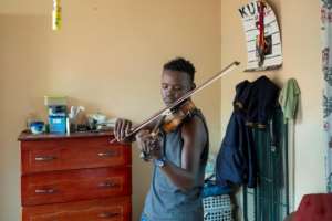 Under apartheid, musical opportunities for children of the black majority were rare as the regime considered it a domain reserved for whites. By WIKUS DE WET (AFP)