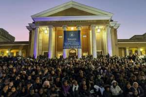 University students in Cape Town held a vigil to protest the recent killings.  By Saawmiet MOOS (AFP)