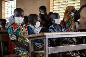 Unlike these pupils in Ouagadougou, displaced children are lucky to have basic materials and some have lessons under the trees.  By OLYMPIA DE MAISMONT (AFP/File)