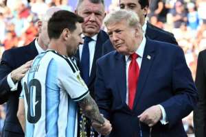 US President Donald Trump consoles Lionel Messi after Argentinas defeat.  By Mandel NGAN (AFP)
