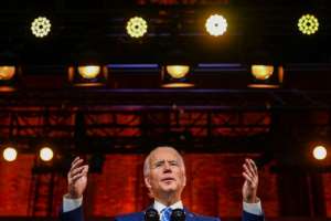 US President-elect Joe Biden delivers a Thanksgiving address at the Queen Theatre in Wilmington, Delaware, on November 25, 2020.  By CHANDAN KHANNA (AFP/File)
