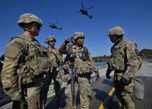 US soldiers participate in a South Korea-US joint military exercise on October 19, 2022. If the US military, the worlds biggest by expenditure, were a country, it would have the worlds highest per capita emissions.  By Jung Yeon-je (AFP/File)
