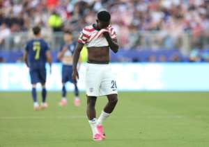 USA striker Folarin Balogun walks off the field after his second-half dismissal in the win against Bosnia-Herzegovina.  By Charlotte Wilson (GETTY IMAGES NORTH AMERICA/AFP)