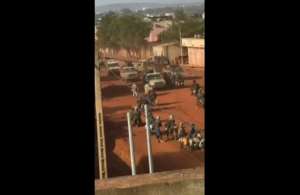 Verified UGC video grab showing fighters in Kati, the hometown of junta leader Assimi Goita.  By anonymous (UGC/AFP)