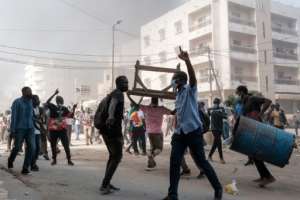 Violent protests have left four people dead.  By GUY PETERSON (AFP)