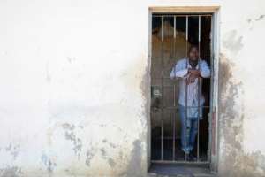 While a chronic cough is a hallmark of infection, people can also carry TB without showing symptoms.  By Alfredo ZUNIGA (AFP)