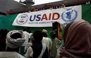 Workers offload US aid destined for South Sudan from the World Food Programme (WFP) at Port Sudan on March 19, 2017: the United States warned it was considering cutting off aid to South Sudan unless its morally bankrupt leaders end their infighting.  By ASHRAF SHAZLY (AFP/File)