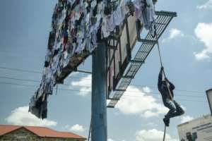 Working between Accra and Paris, Tieku, 31, has spent years transforming discarded textiles into large-scale installations.  By CLAUDIA LACAVE (AFP)