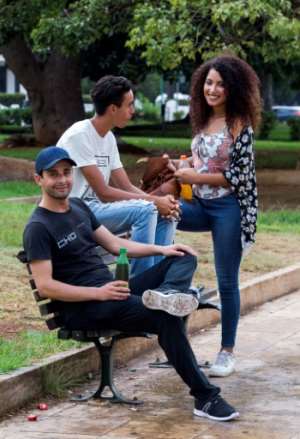 Young Moroccans in the capital Rabat on September 12, 2018, as parliament prepares to debate a bill that will require many men and women aged 19 to 25 to serve a year in the military.  By FADEL SENNA (AFP)