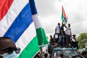 Youth movement GALA staged the protest in Banjul to call on President Adama Barrow to tackle corruption.  By MUHAMADOU BITTAYE (AFP)