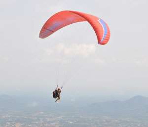 A paraglider airborne