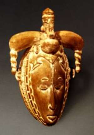 Face mask with elaborate hairdo, National Museum, Lagos, Nigeria.