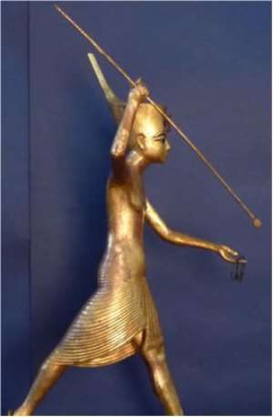 Gilded Wooden Figure of Tutankhamun on a Skiff, Throwing a Harpoon: The figure was found missing following the looting and vandalism that happened in the museum on January 28, 2011.It seems to have been broken off by the looters, and all that remains are the kings feet, right arm, harpoon and the bronze hoop that the king had held in his left hand. Description and image from list of missing items issued by Supreme Council of Antiquities. https://www.sca-egypt.org