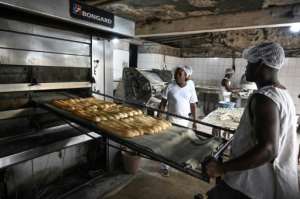 A bakery in Yopougon, a working class suburb of Abidjan, where the flour mix is used to make bread. Consumers may take time to adapt to the starchier taste, say bakers. By Sia KAMBOU AFP