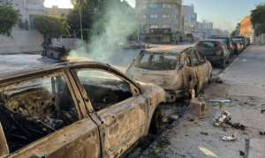 A cautious calm had set in by Saturday evening. By Mahmud TURKIA AFP