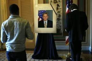 A condolence book and a picture of US ambassador Christopher Stevens are displayed at the Capitol on September 14, 2012, after he and three other Americans were killed in the Benghazi attack. By ALEX WONG GETTY IMAGES NORTH AMERICAAFPFile