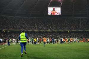 A crowd of 30,000 attended Ivory Coast's win over Algeria and a considerable number of fans invaded the pitch at the end. By CHARLY TRIBALLEAU AFP