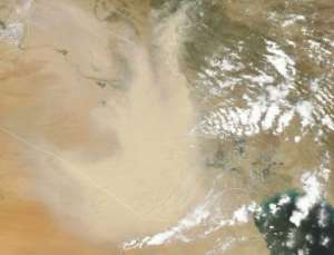 A satellite image provided by NASA Earth Observatory taken on May 5, 2022, shows a dust storm engulfing parts of Iraq and neighbouring countries. By - NASA Earth ObservatoryAFP