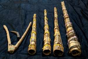 A set of traditional wazza instruments R, and the qarn made from an animal horn L top, and the affeh L bottom.  By ASHRAF SHAZLY AFP
