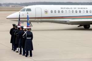 A US military honor guard approaches Namibian President Hage Gottfried Geingob's plane as he arrives at Joint Base Andrews in Maryland to attend the US-Africa Leaders Summit.  By OLIVER CONTRERAS AFP