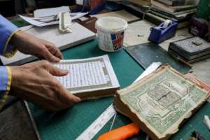 A workshop in Tripoli allows Libyans to revive copies of the Koran with sentimental value, often passed on to them by loved ones. By Mahmud Turkia AFP