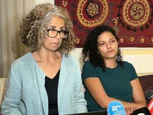 Ahdaf Soueif, aunt of Alaa Abdel Fattah, and his sister Sanaa Seif, speak to reporters after visiting him in prison on Thursday. By - AFP