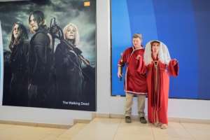 Amateur cosplayers pose at the entrance of Comic Con Africa. By LUCA SOLA AFP