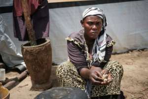 Amissa Irakoze and her family languish in a makeshift camp behind the lakeside city of Gatumba. By Yasuyoshi CHIBA AFP