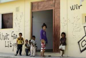 An acute housing shortage in Tripoli has forced many Libyan families to squat in the once-feared Bab al-Aziziya compound where Kadhafi lived and ruled during his 40-year dictatorship. By JOSEPH EID AFPFile