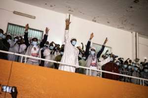 Barrow waves to supporters after securing a second presidential term. By JOHN WESSELS AFP