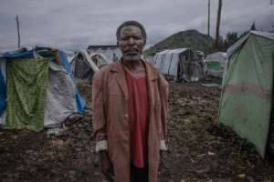 Bazimenya Gasore, 71, became separated from his family in the flight. By Guerchom Ndebo AFP