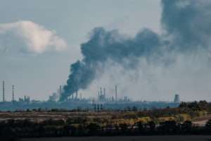Black smoke rises near Slovianska power station in the Donetsk region on October 13, 2022, amid the Russian invasion of Ukraine. By Yasuyoshi CHIBA AFPFile