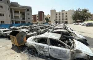 Burnt cars in Libya's capital Tripoli seen after clashes last month between backers of rival governments killed at least 32 people. By Mahmud TURKIA AFPFile