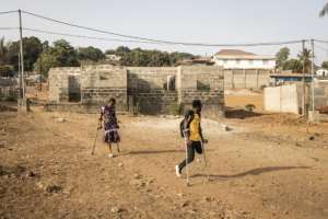 Coach Lahai Makieu, 49, is about to marry his 28-year-old partner Zainab Turay, one of the female footballers. By JOHN WESSELS AFP
