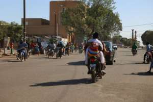 Commuters on Sunday in Ouagadougou, where gunfire was heard at several military barracks. By Olympia DE MAISMONT AFP