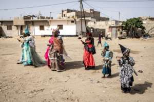 Demand for the dresses has been a boon for tailors in Saint-Louis who can replicate the style. By JOHN WESSELS AFP